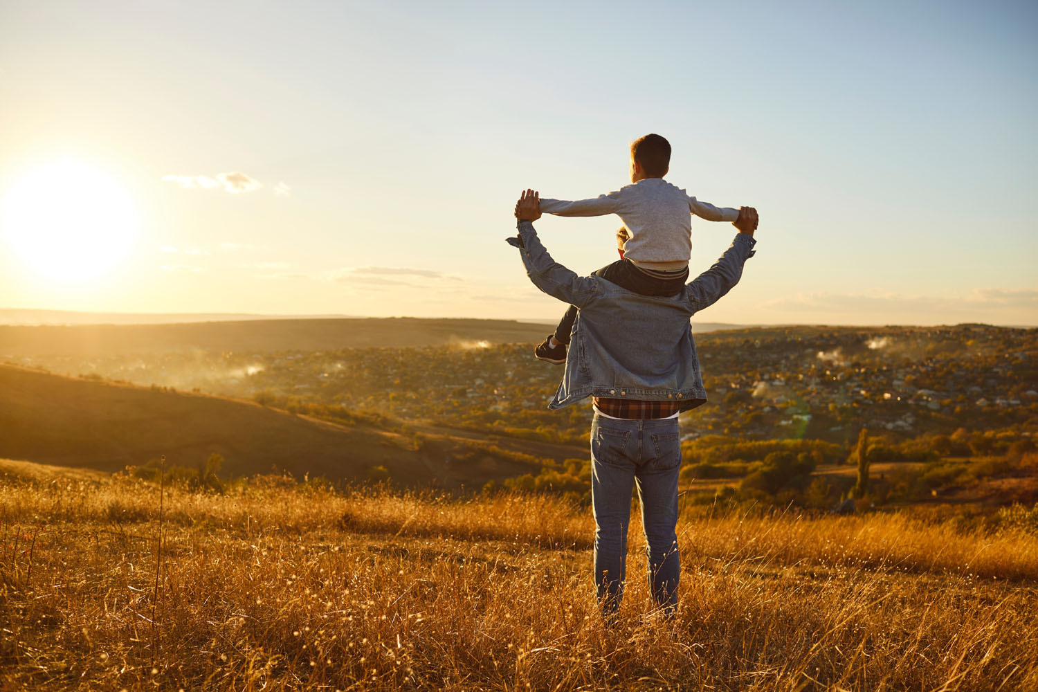 Father youngchild sunset