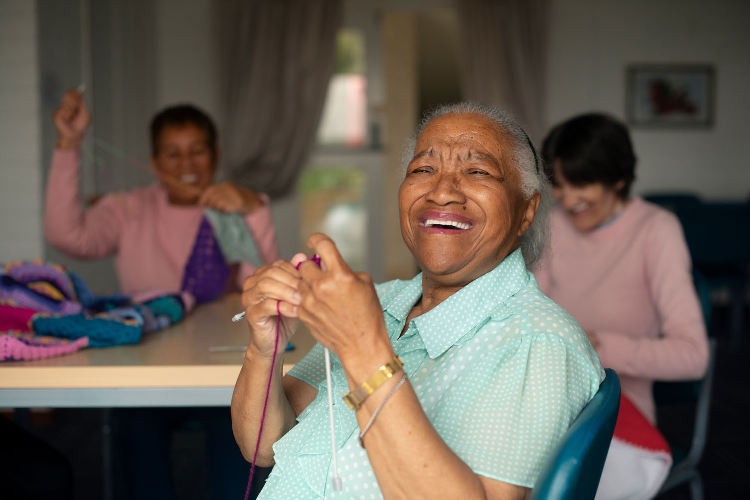 Laughing knitting ladies