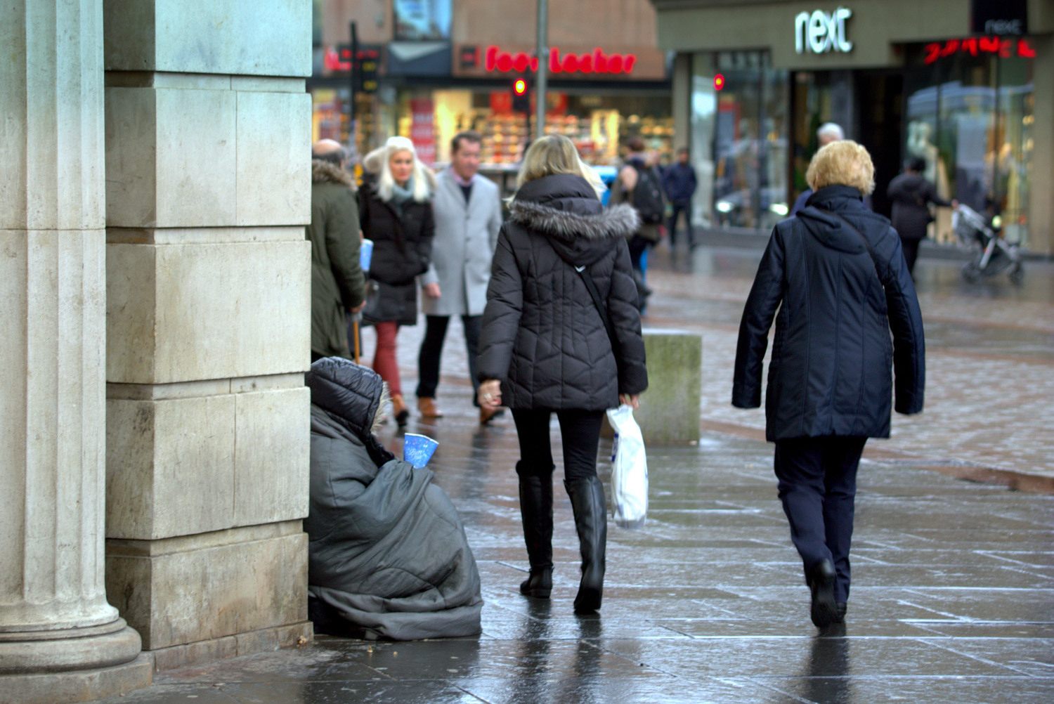 Someone begging in uk shopping street