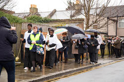 Wet uk palm sunday procession 250px